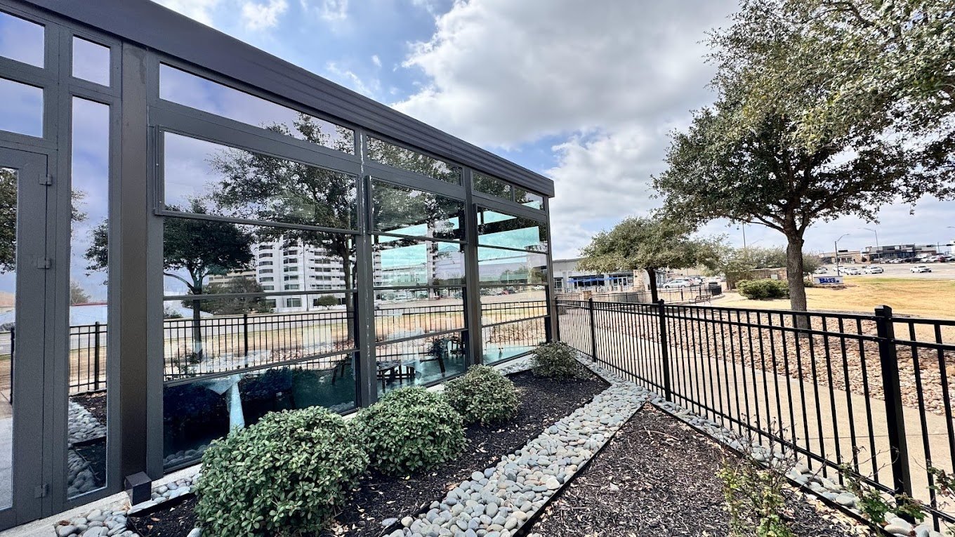 Motorized guillotine vertical glass walls