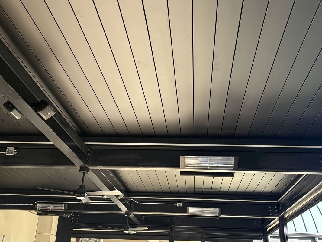 Louvered roof with heaters and fans