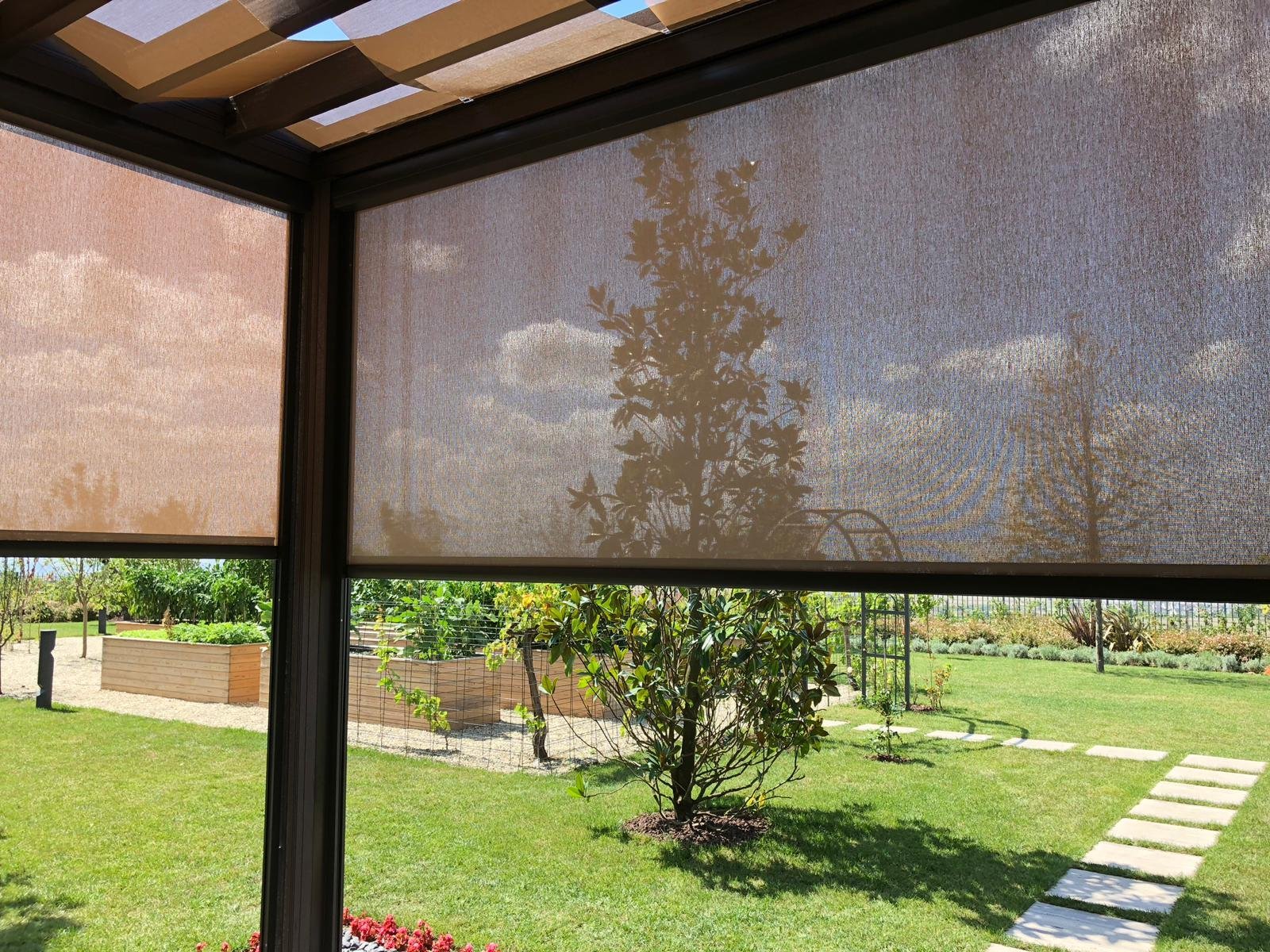 Motorized zip screen lowered on a pergola